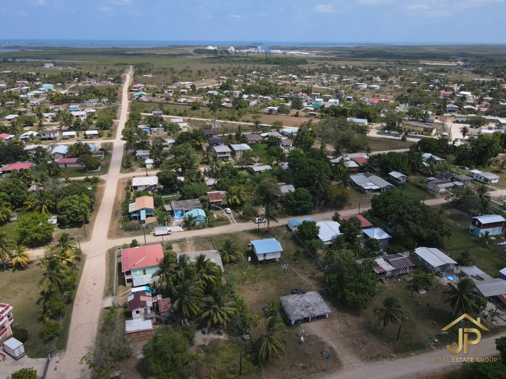 double lot for sale in Belize - Independence Village view - JP Real Estate Group