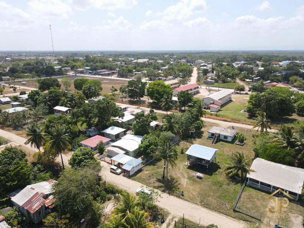double lot for sale in Belize - Independence Village view - JP Real Estate Group