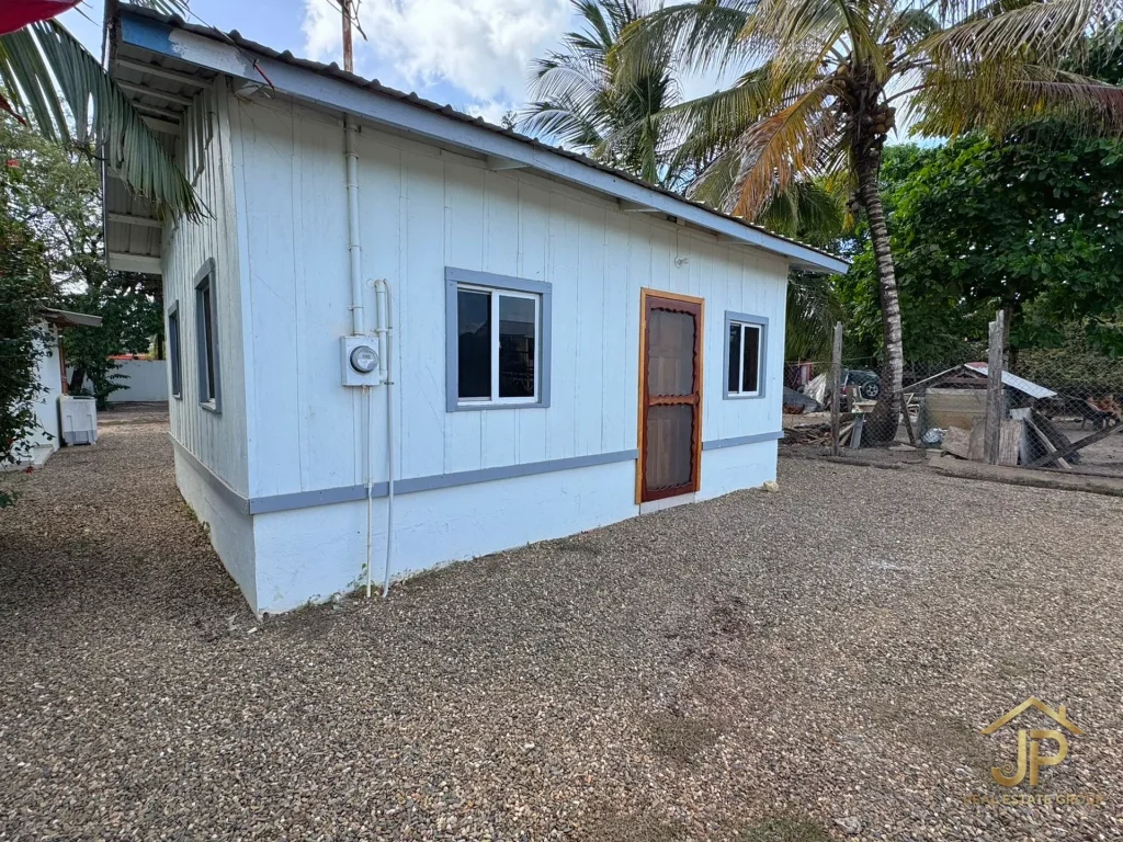 income property for sale in Belize - Santa Cruz Village view - JP Real Estate Group
