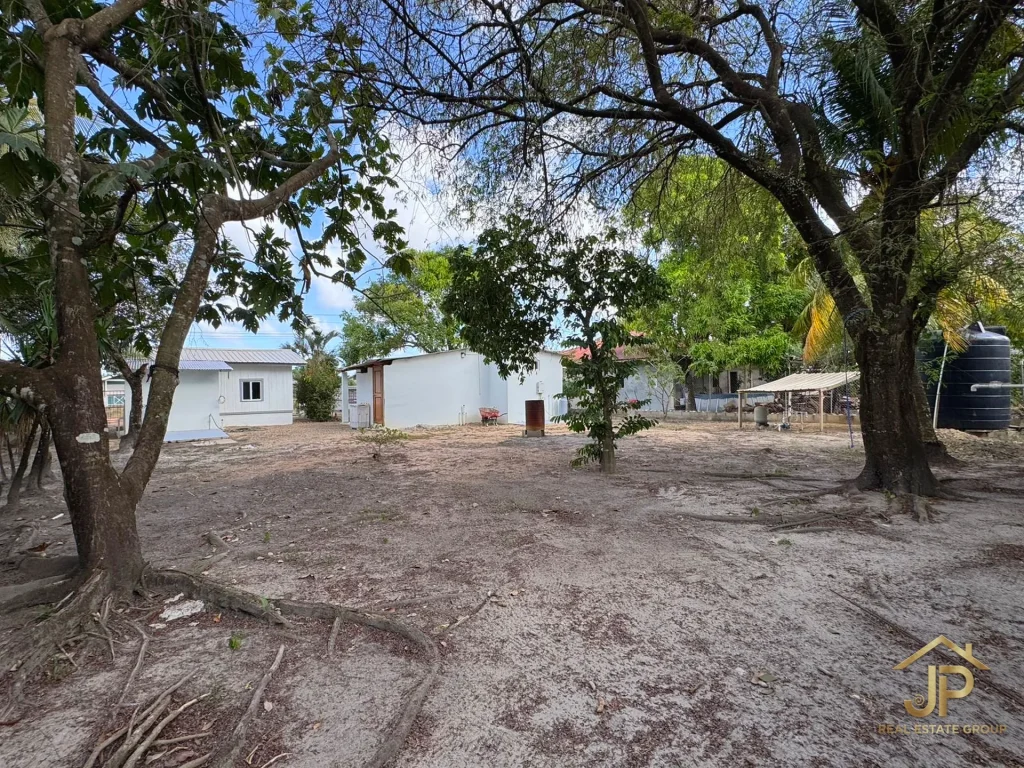 income property for sale in Belize - Santa Cruz Village view - JP Real Estate Group