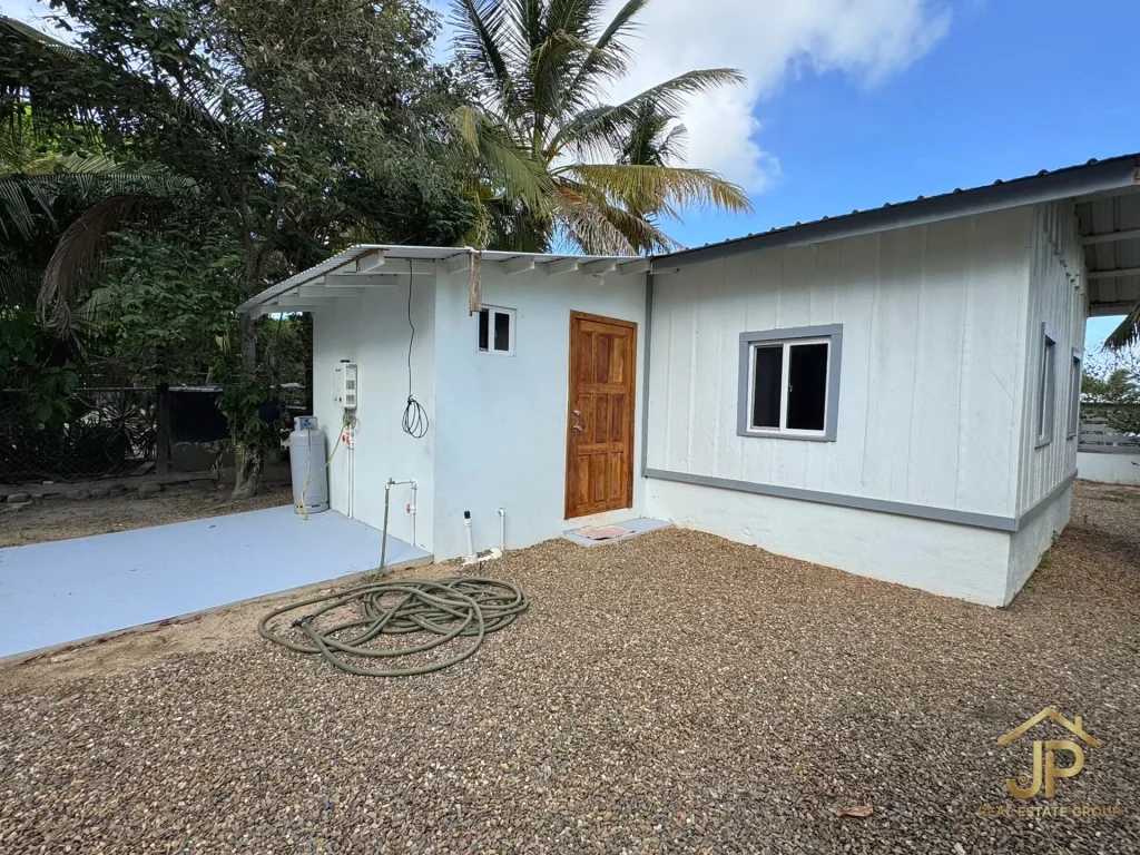 income property for sale in Belize - Santa Cruz Village view - JP Real Estate Group