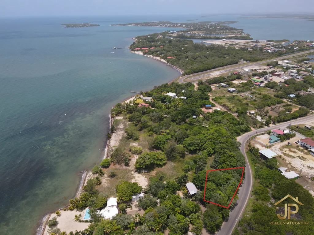 0.23-acre Placencia Belize lot marked in coastal neighborhood aerial view - JP Real Estate Group