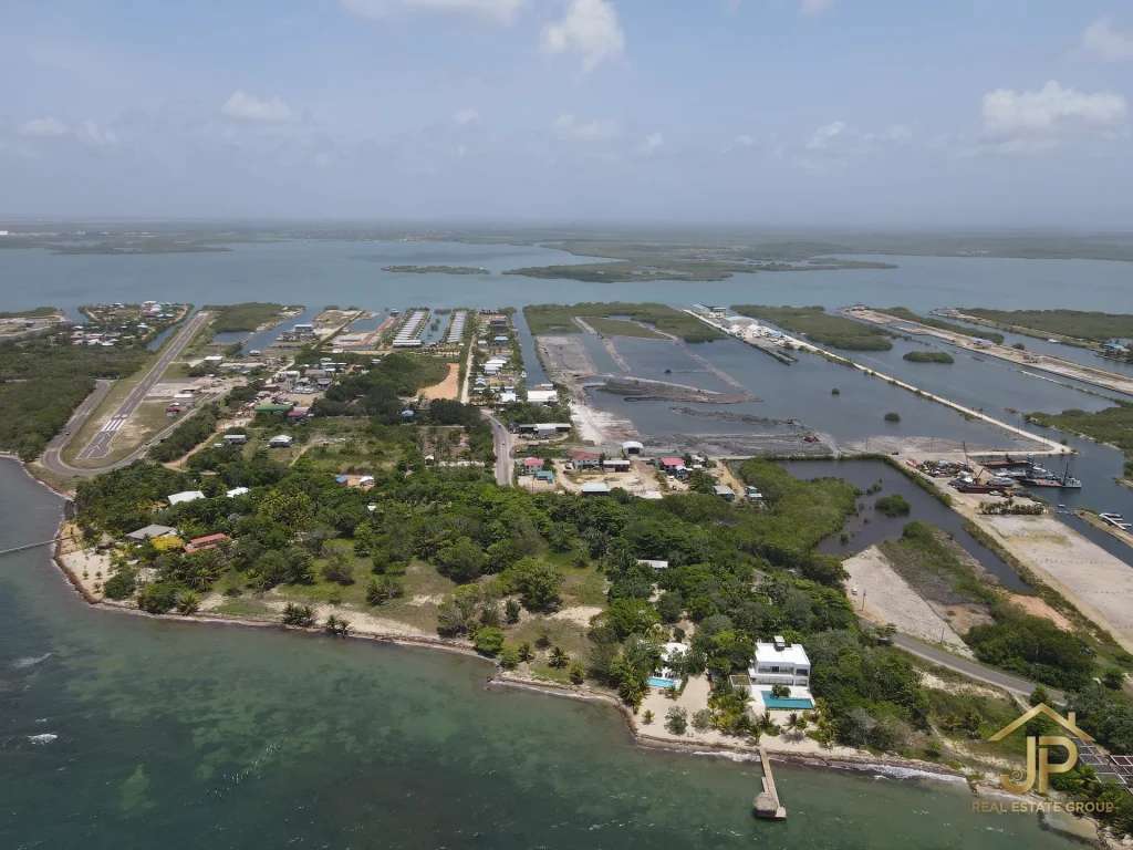 Rum Point Placencia neighborhood aerial view near lagoon and village access - JP Real Estate Group