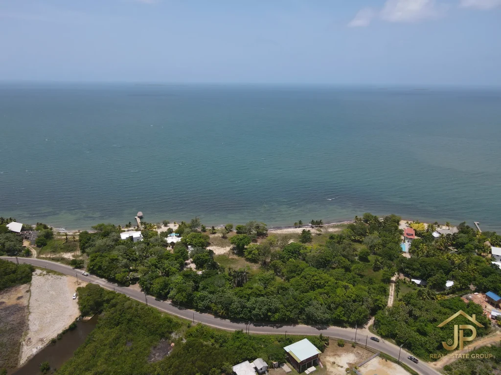 0.23-acre lot for sale in Belize with road access and coastal setting - JP Real Estate Group