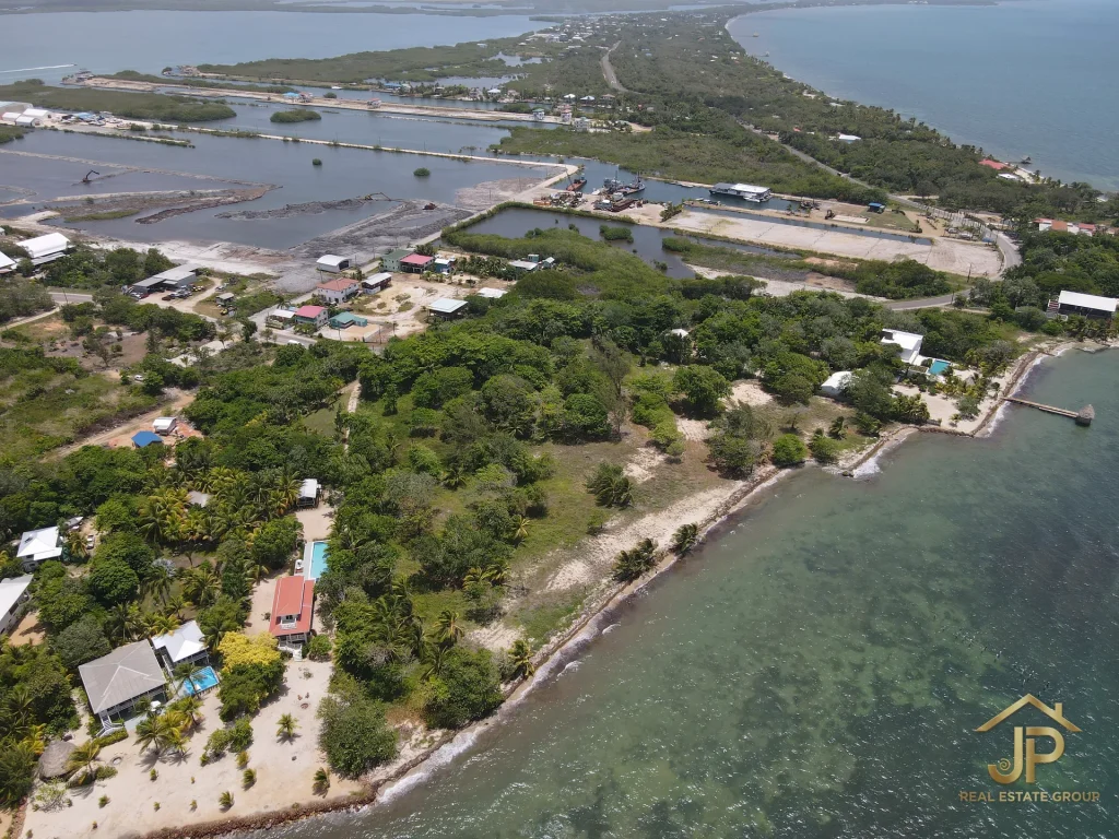 Placencia Belize development lot aerial view near water and airport access - JP Real Estate Group