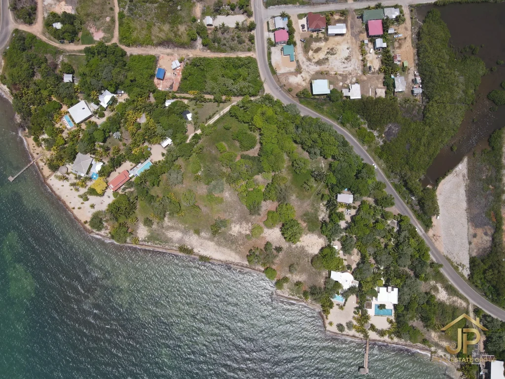 Rum Point Placencia lot aerial overview with road and coastal context - JP Real Estate Group