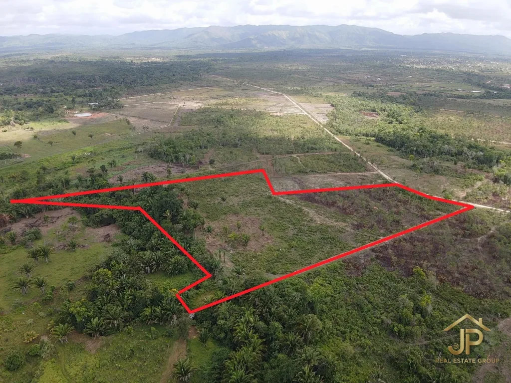 Santa Cruz Belize creekfront land for sale aerial view with road access and parcel outline - JP Real Estate Group