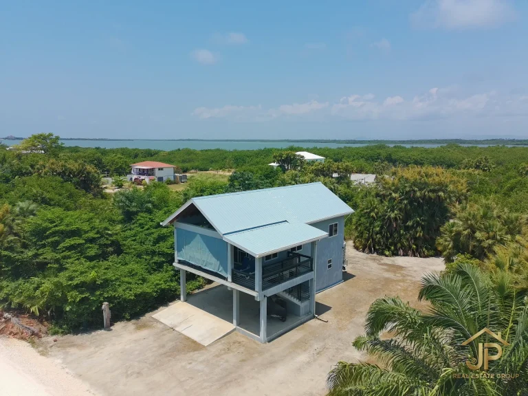 Open living and kitchen area in Placencia Peninsula duplex
