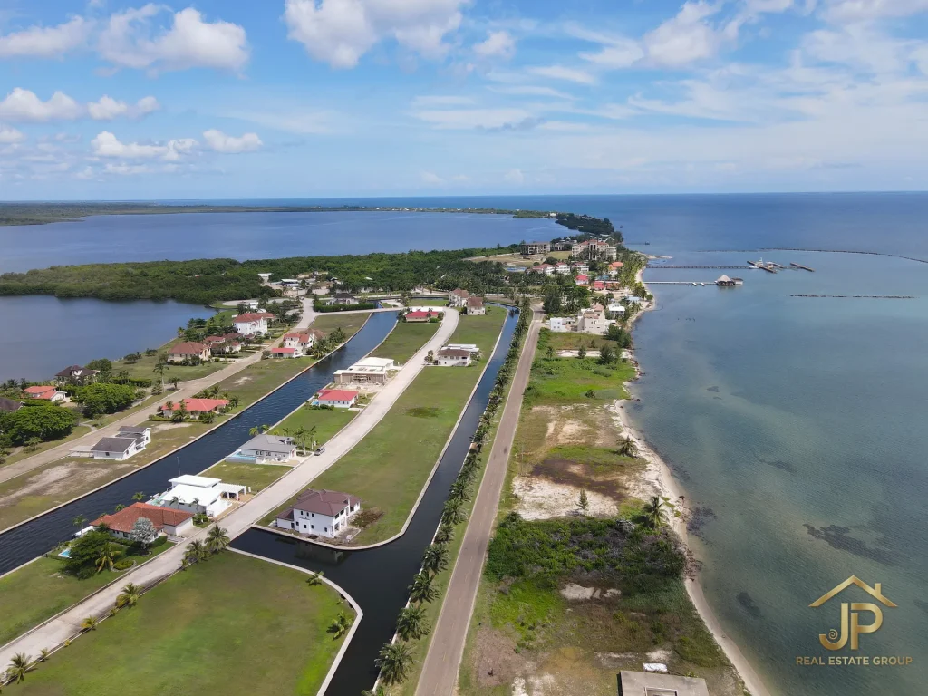 beachfront lots for sale in Plantation Belize aerial view toward Placencia Peninsula - JP Real Estate Group