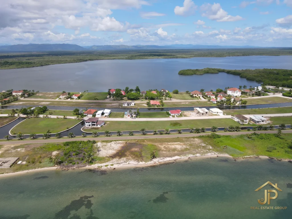 four beachfront lots for sale in Plantation Belize aerial property context - JP Real Estate Group