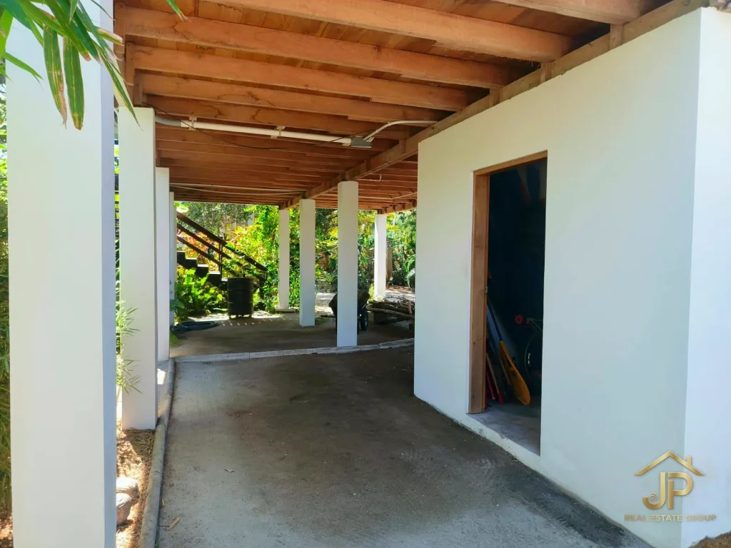 Screened sitting area in Kokomo home for sale
