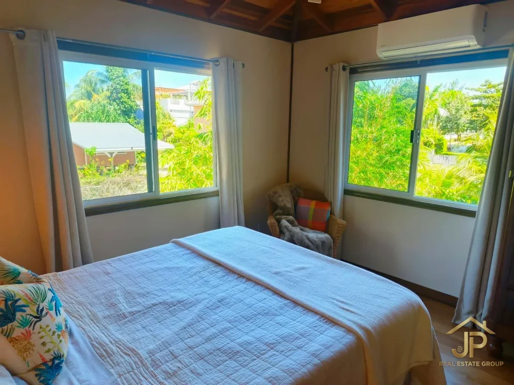 Bathroom and laundry area in Kokomo Belize home