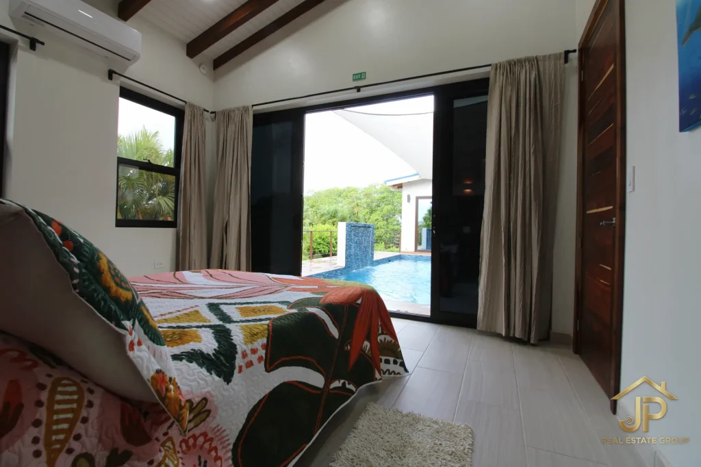 Drone view of Naia waterfront home on Placencia Peninsula