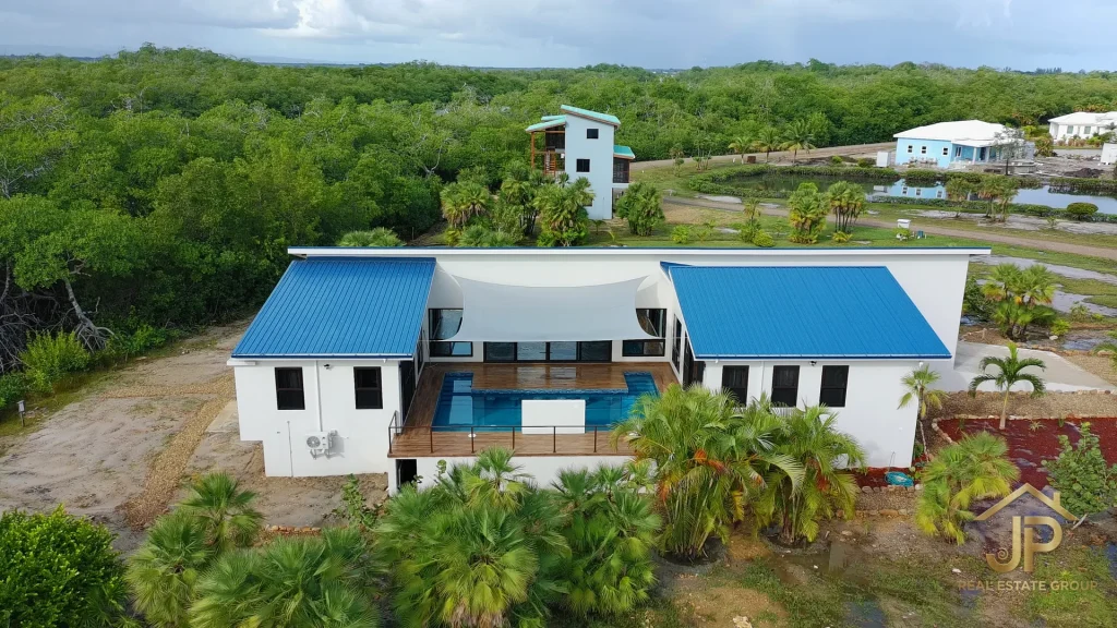 Bedroom opening to pool at Naia home for sale