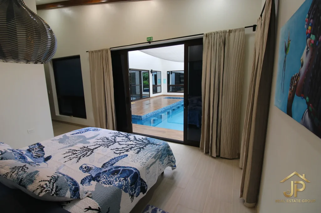 Night view of private pool at Naia lagoonfront residence