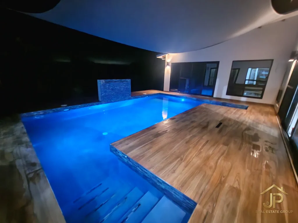 Open kitchen and living area in Naia Placencia home