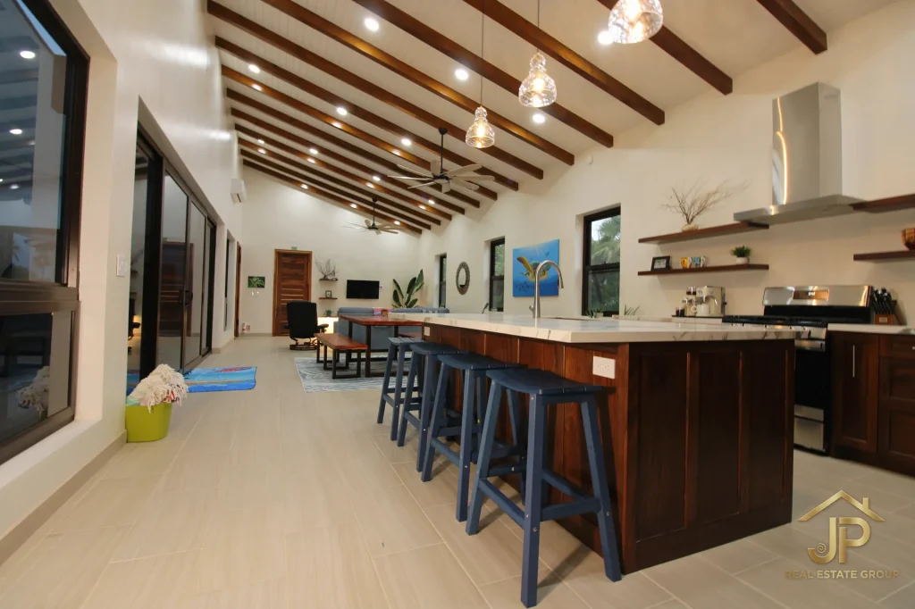 Bedroom with sliding doors to pool at Naia residence