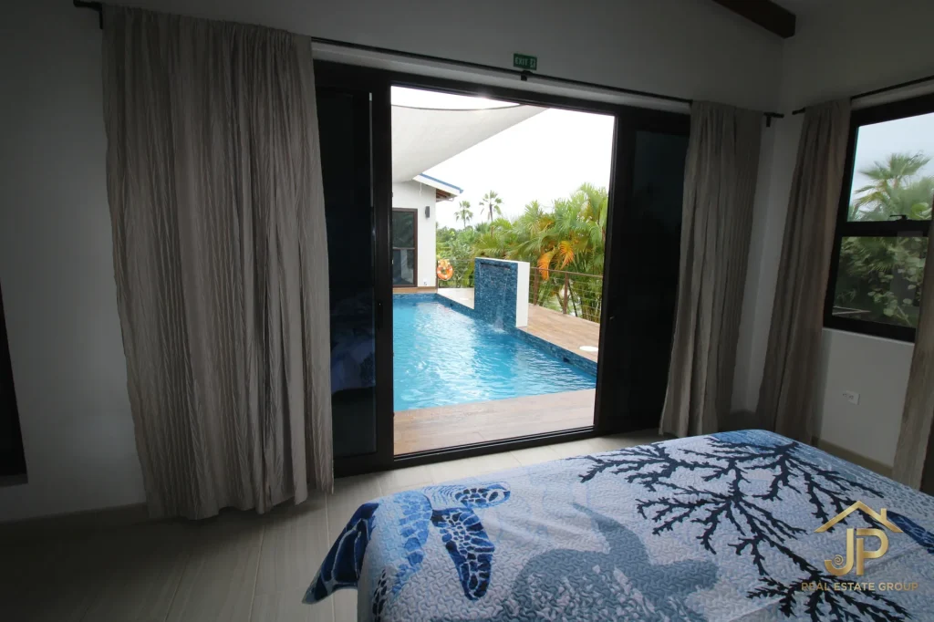 Pool and patio at Naia lagoonfront home for sale