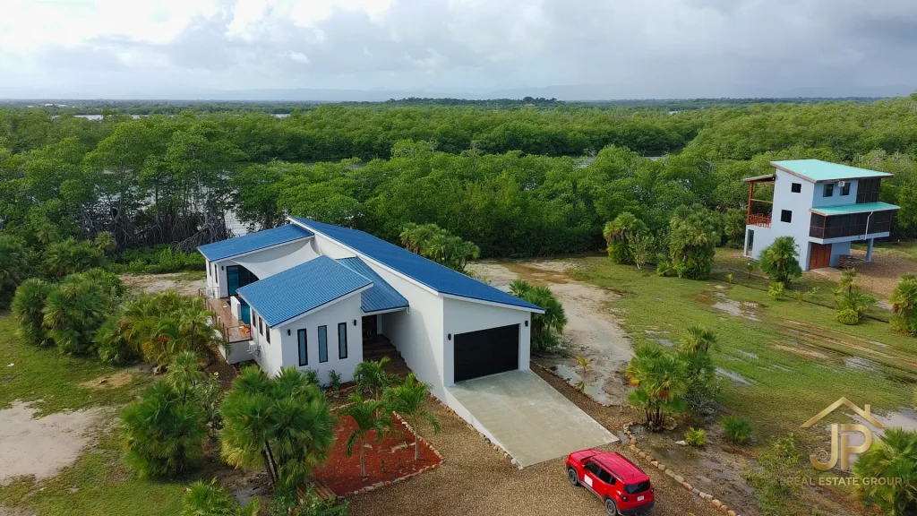 Garage and front entry at Naia lagoonfront home