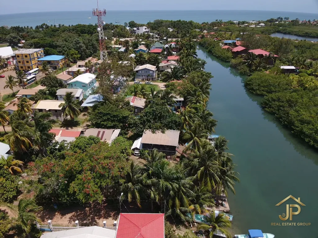 fixer-upper real estate in Placencia Belize village-core aerial context - JP Real Estate Group