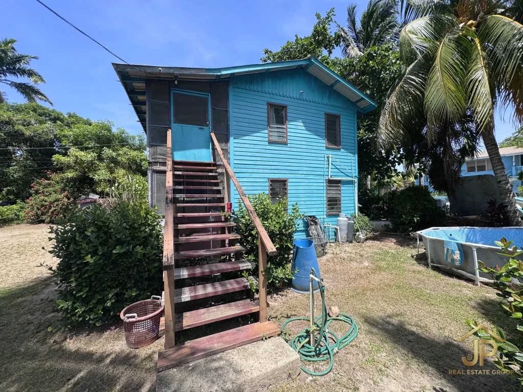 canal frontage and boat access at Placencia Village waterfront property - JP Real Estate Group