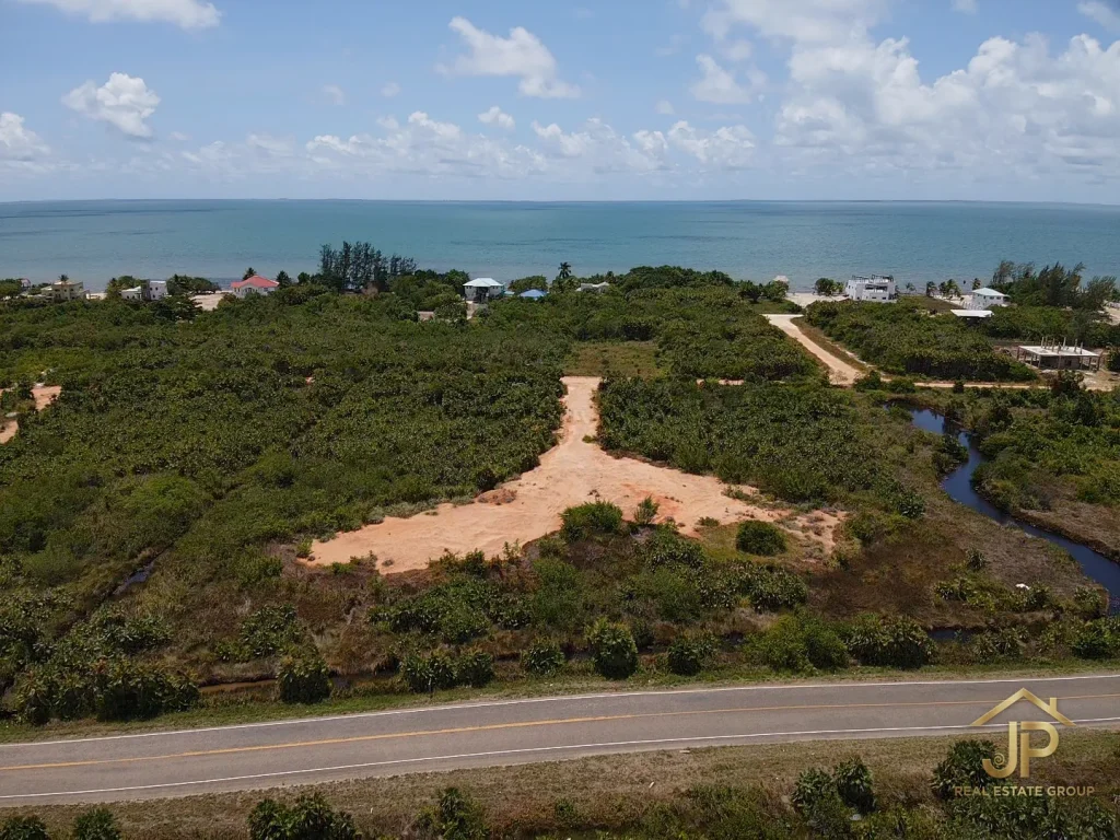 Caribbean Way residential lots for sale with road access and coastal neighborhood context - JP Real Estate Group