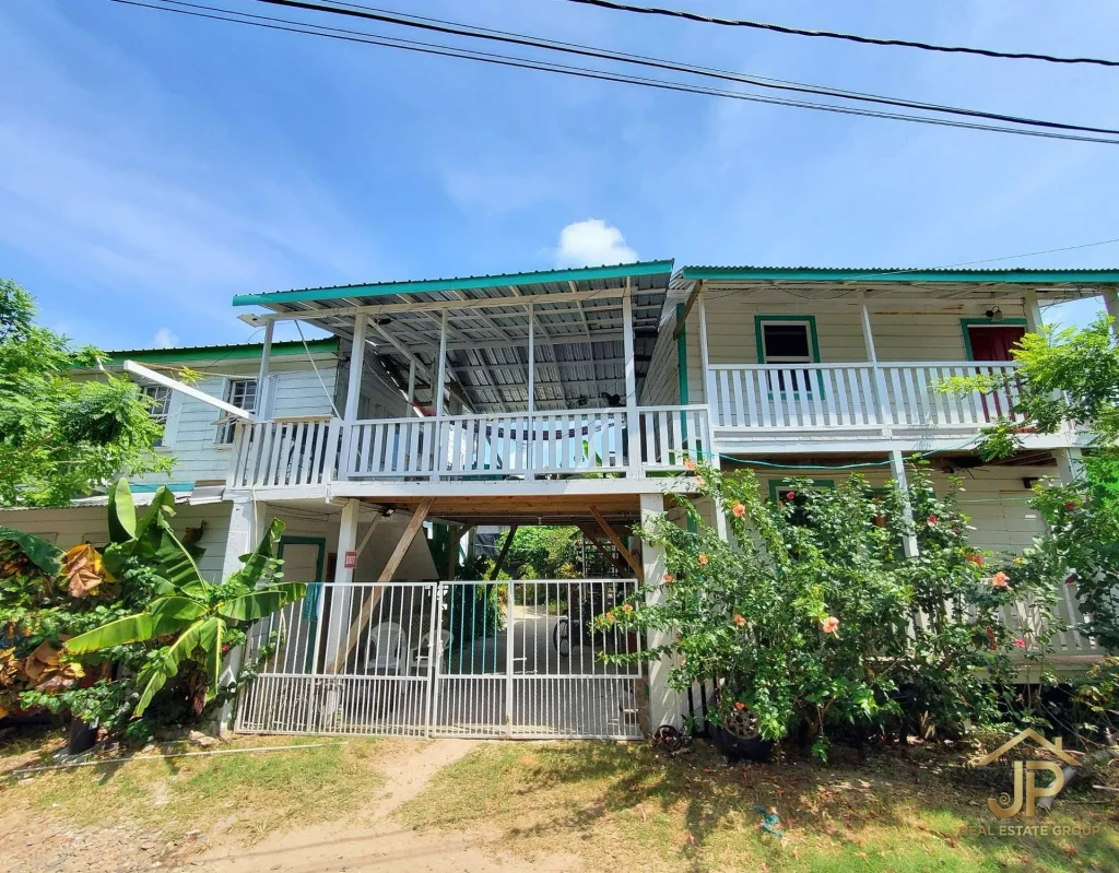 Interior dining and kitchenette area at Placencia Village hotel property