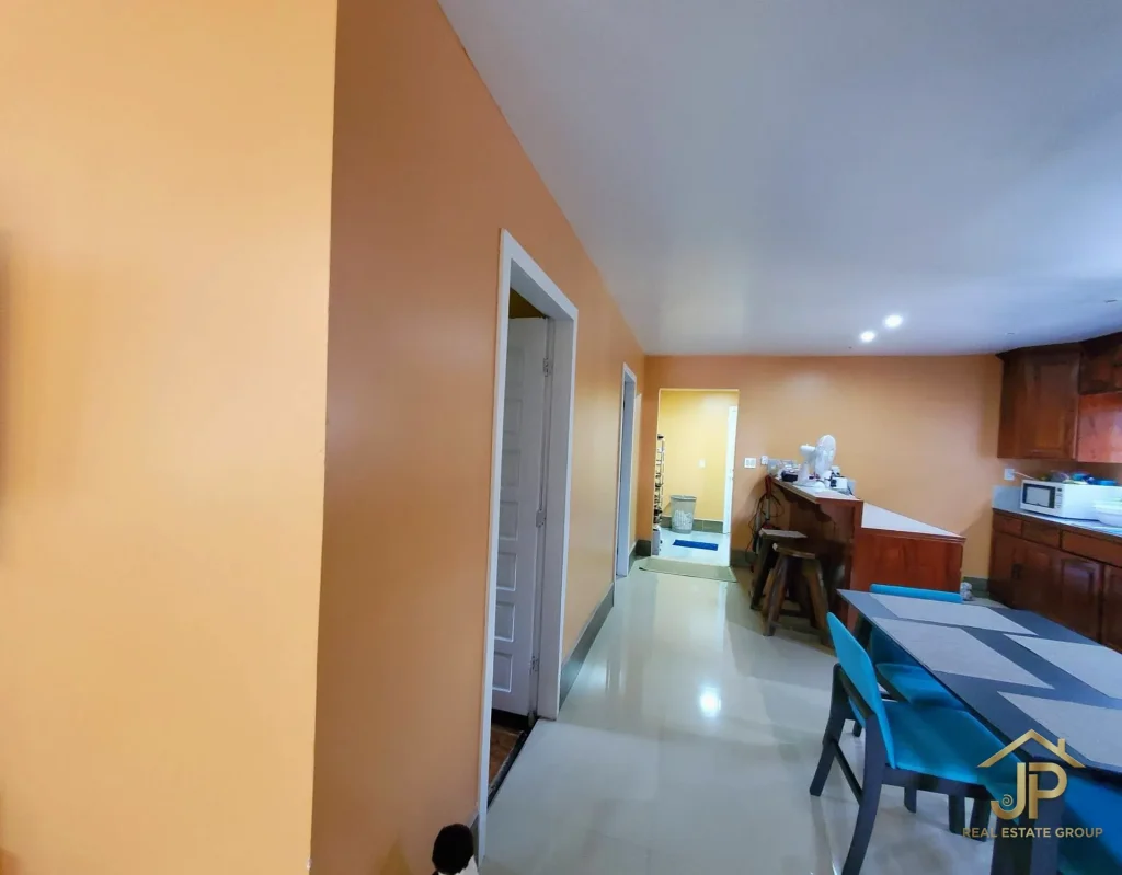 Guest bedroom in Placencia Village boutique hotel for sale