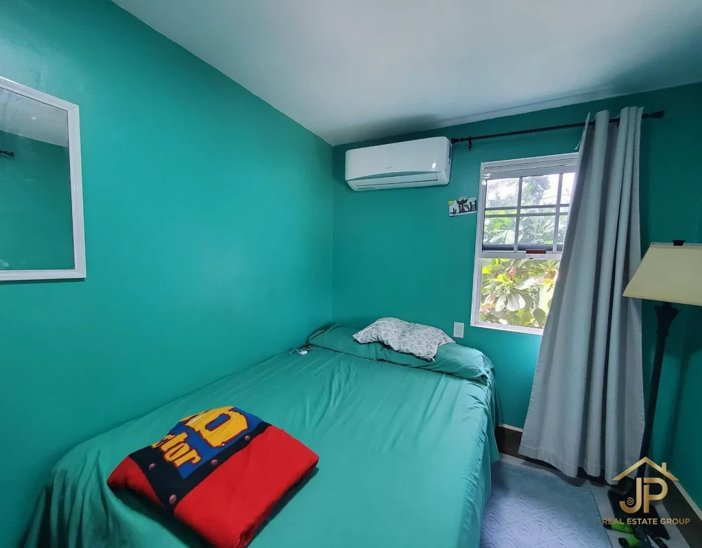 Entry area inside operational hotel property in Placencia Village