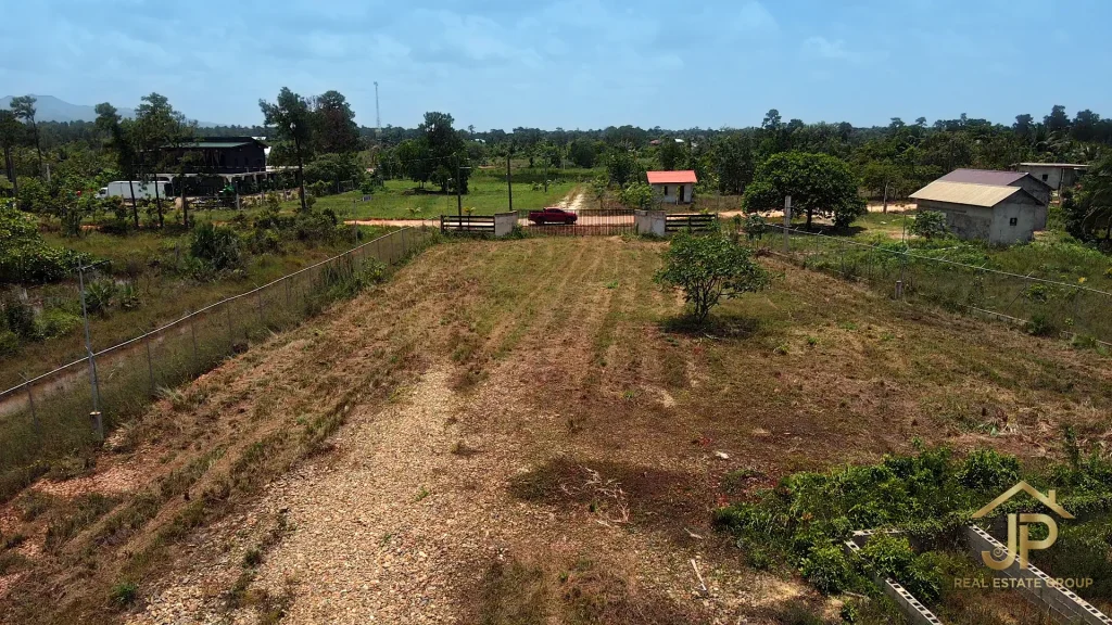 Graded 5-acre lot with village road frontage in Santa Cruz, Stann Creek