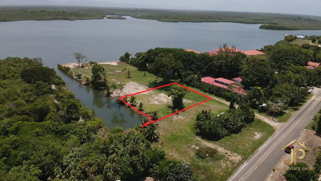 canal front lot for sale in Maya Beach Placencia marked aerial with private canal and lagoon - JP Real Estate Group