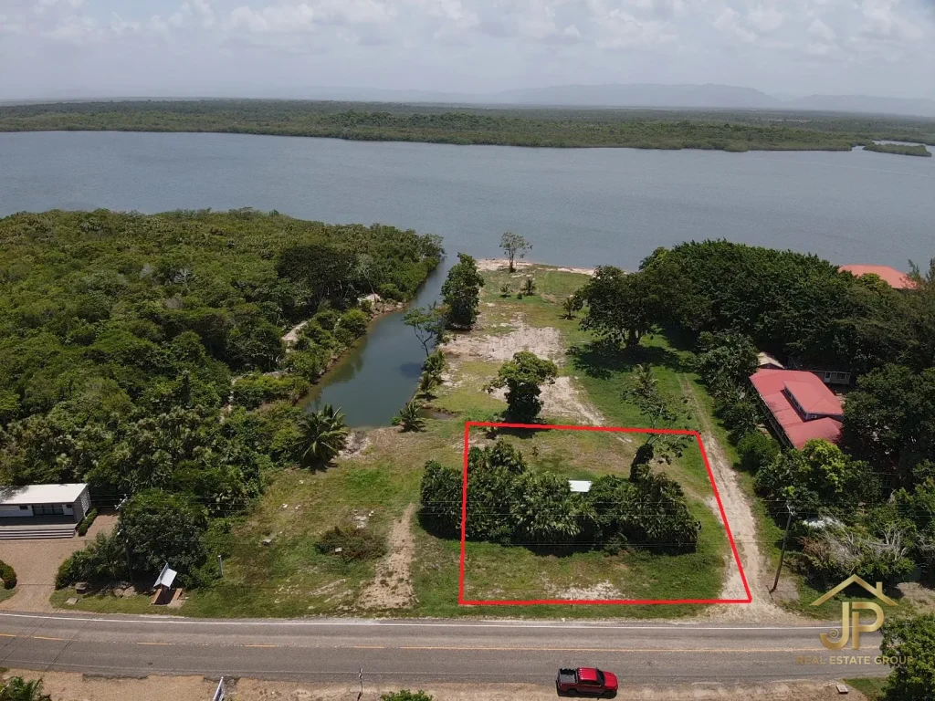 commercial land for sale in Placencia Belize marked lot aerial on main Placencia Road - JP Real Estate Group