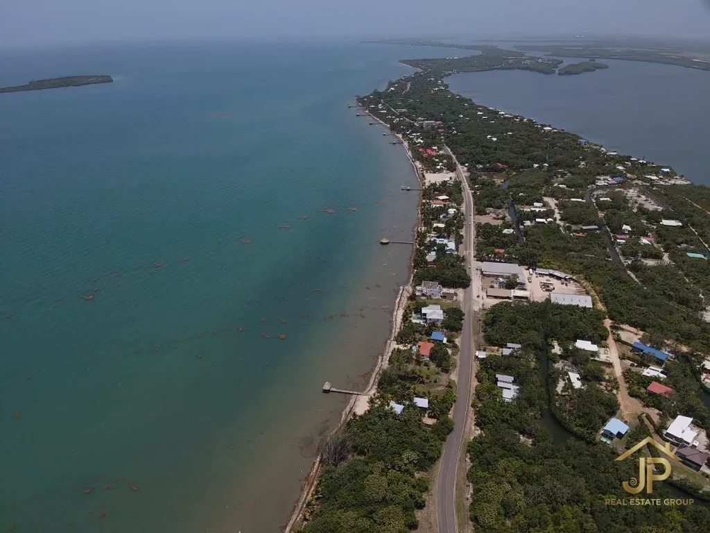 Placencia Road main artery aerial view near Maya Beach commercial lots - JP Real Estate Group