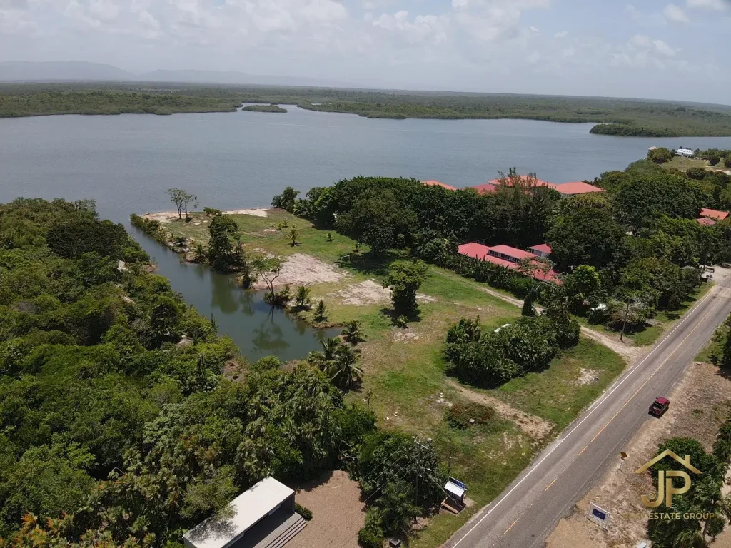 Maya Beach lagoon front lots aerial with Placencia Lagoon frontage and Maya Mountain views - JP Real Estate Group