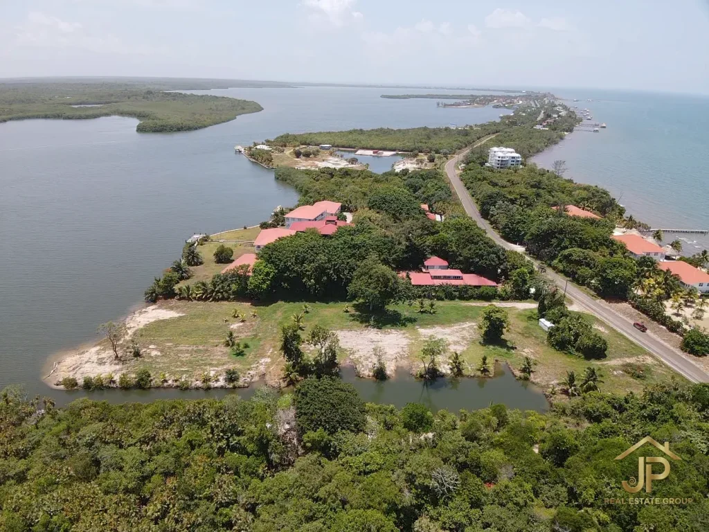 Placencia Peninsula lagoon front land aerial view south along coastline near Maya Beach - JP Real Estate Group