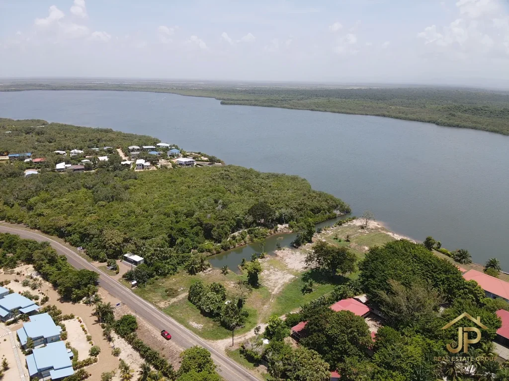 Placencia Lagoon waterfront lots Maya Beach aerial view with private canal - JP Real Estate Group