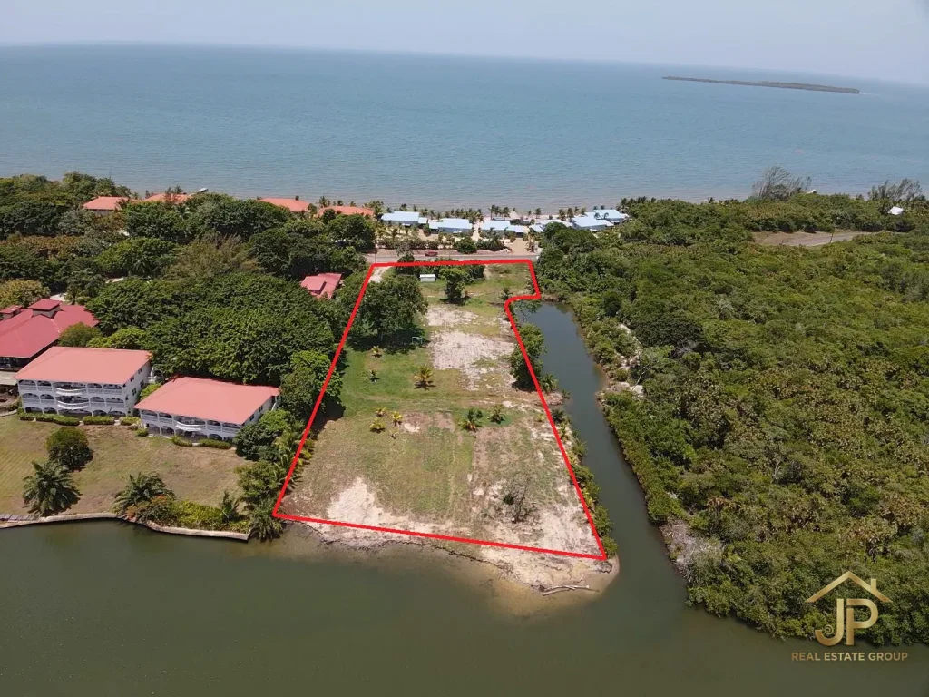 2.3 acre waterfront development parcel Maya Beach Placencia marked aerial from beach side - JP Real Estate Group