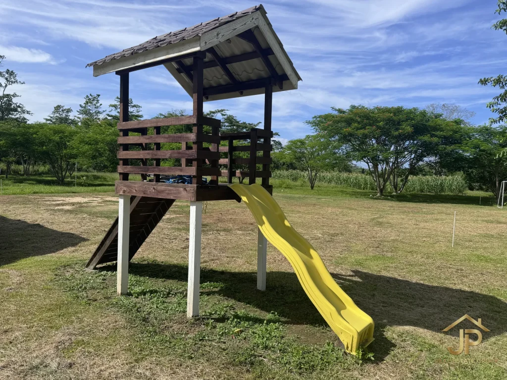 family playground on Red Bank ranch estate - JP Real Estate Group