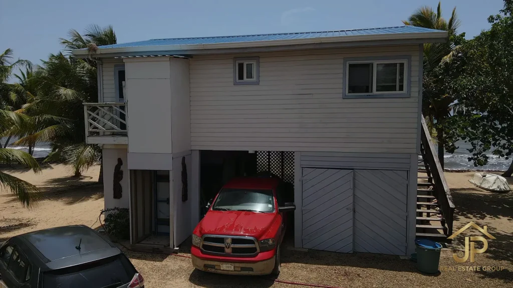Secure garage beneath the elevated Mayacan main residence