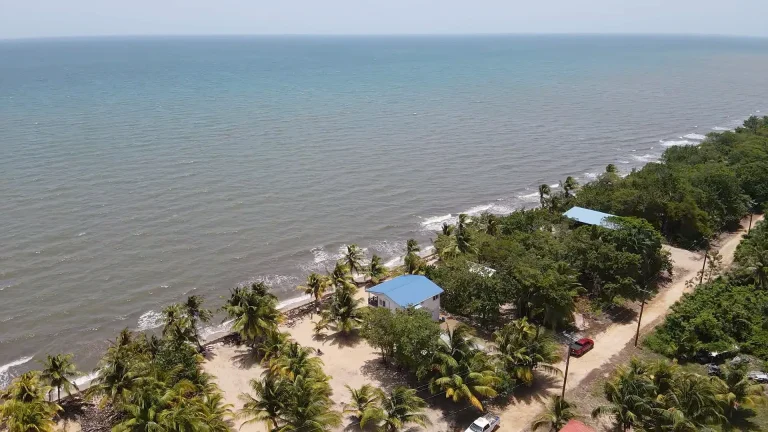 Aerial view of beachfront home for sale in Mayacan Belize