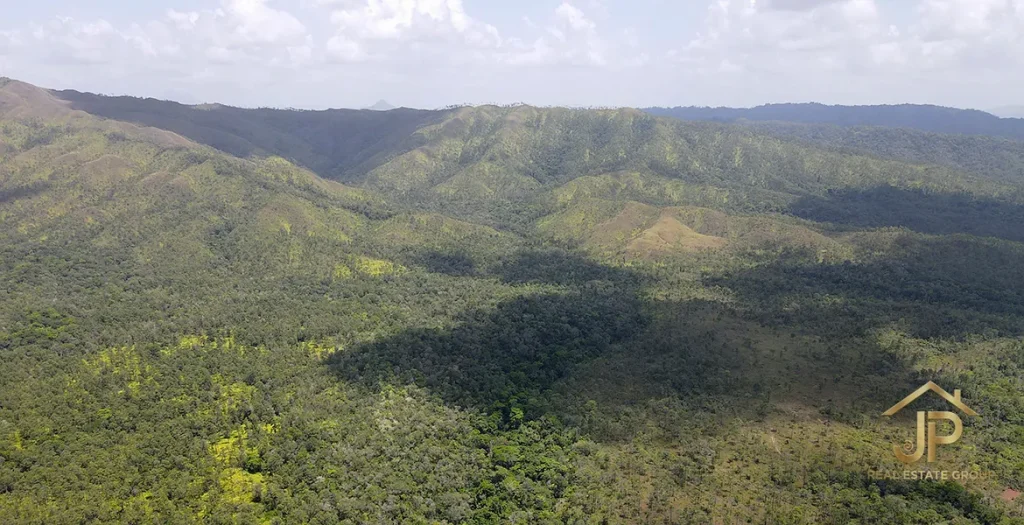 Aerial view of tropical mountain terrain near the Kendall acreage