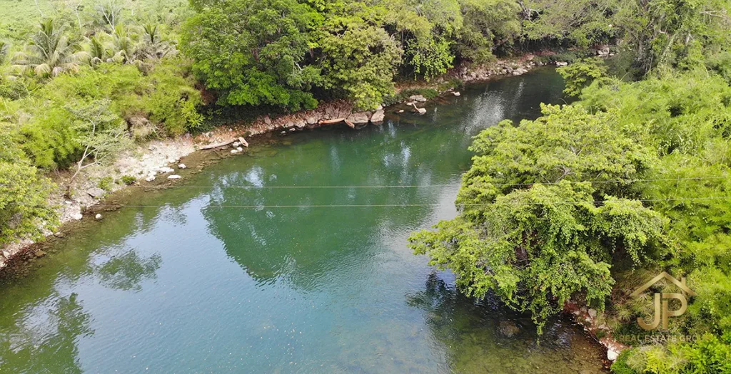 Moho River frontage beside the 97-acre property in Toledo District