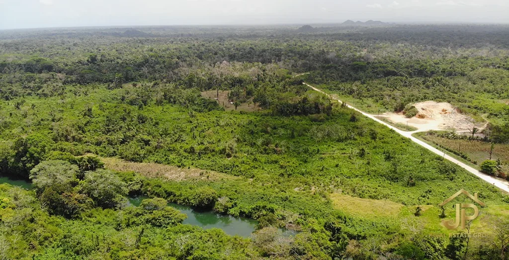 Aerial view of a road and the Moho River near the 97-acre Toledo property